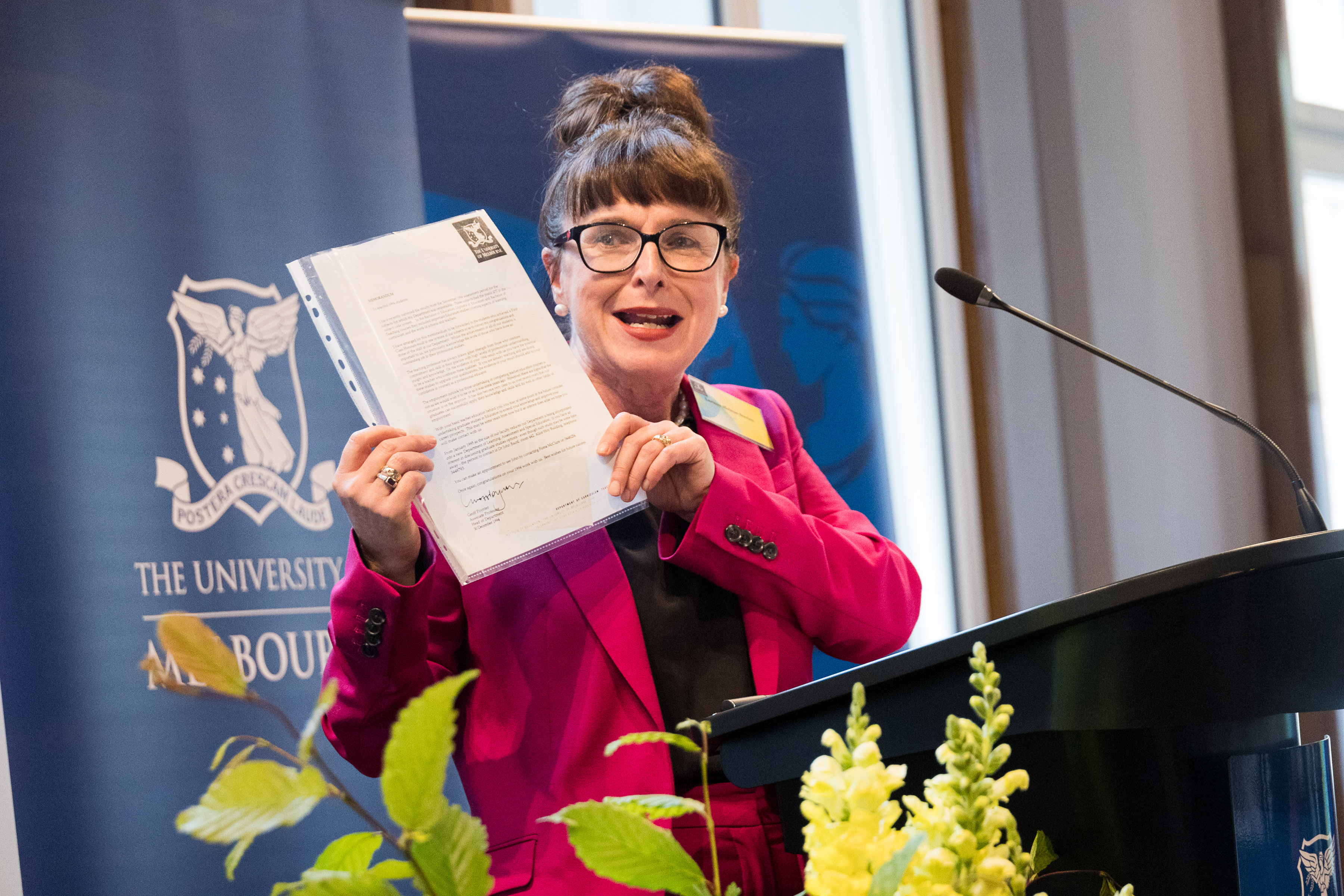 Deputy Dean, Professor Larissa McLean Davies, presenting her letter from 1994, informing her there are currently no jobs for teachers. Photo: Peter Casemento.