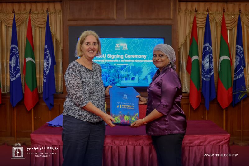 Dr. Aishath Shehenaaz Adam, Vice Chancellor of MNU, and Dr. Rhonda Di Biase, academic at the Faculty of Education, signing the MOU at Maldives National University. Image:  Maldives National University.
