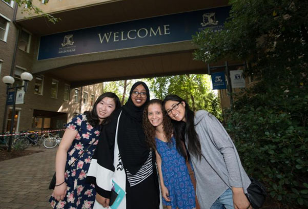 group of diverse female students on campus